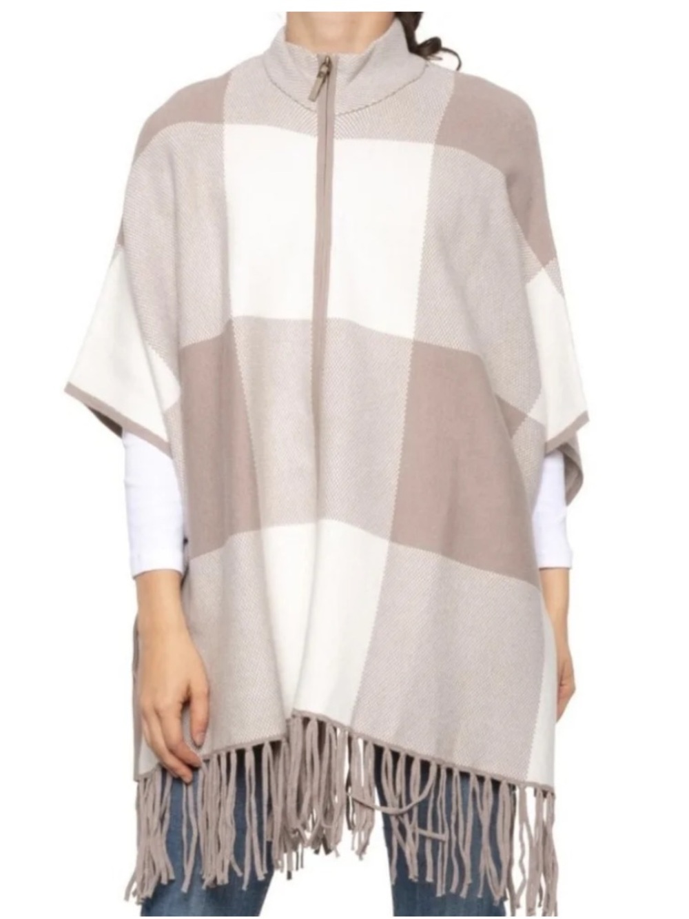 Christian Siriano NWT poncho features a distinctive taupe and white with fringes